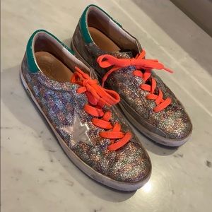 Girl Golden Goose shoes.